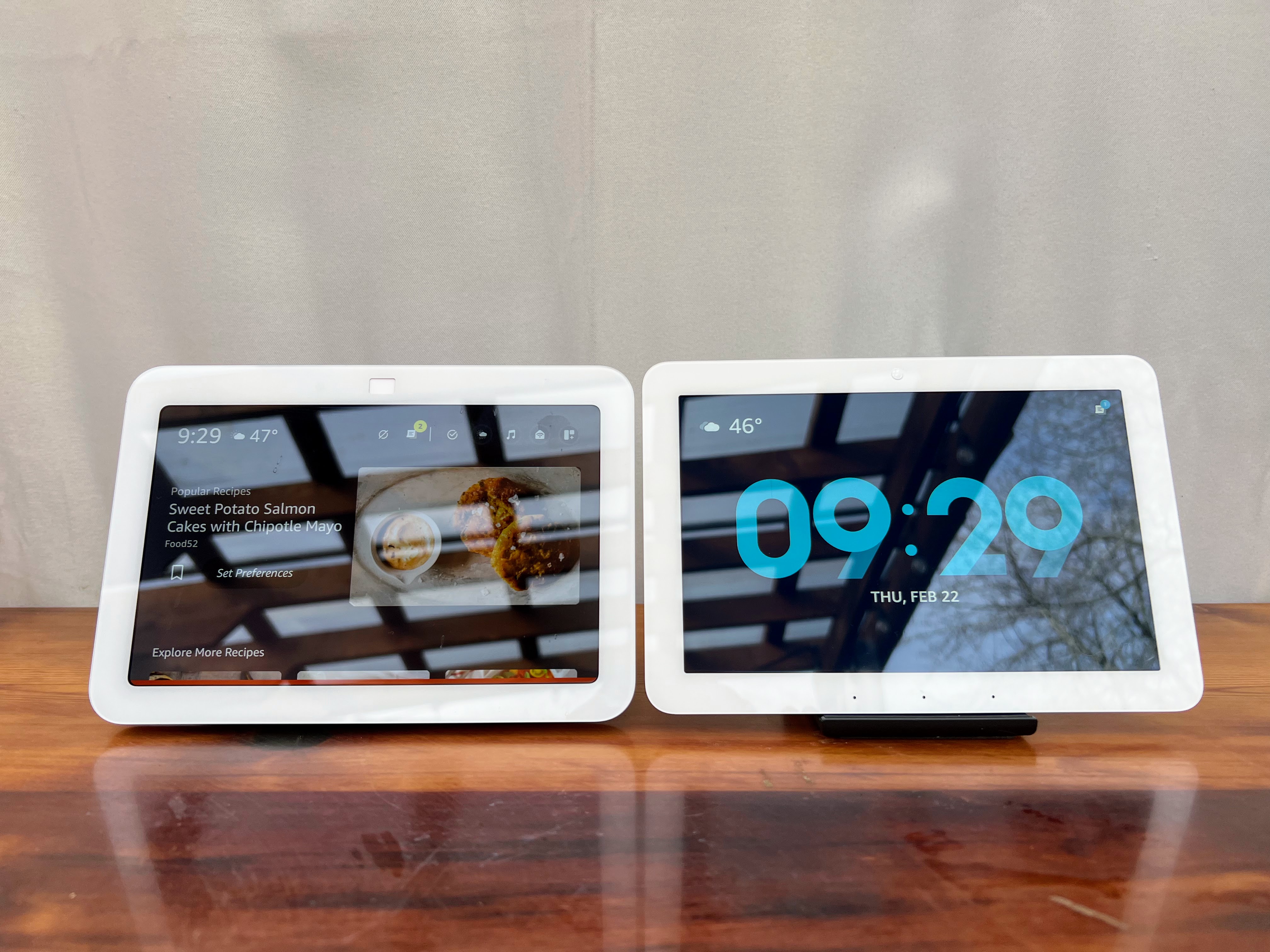 An Amazon Echo Show 8 and Echo Hub sit side by side.