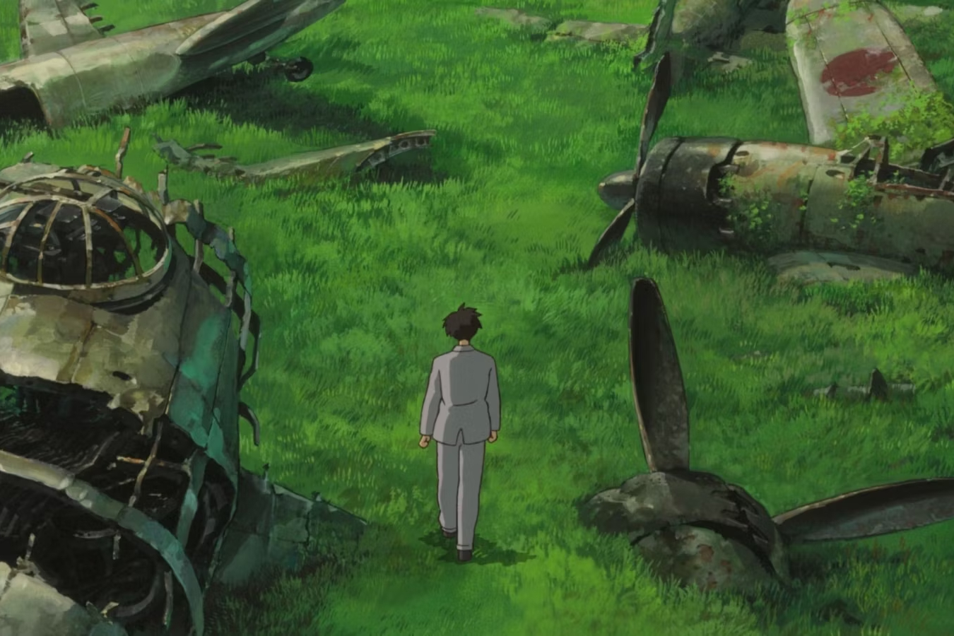 Jiro camina por un cementerio de aviones en The Wind Rises.