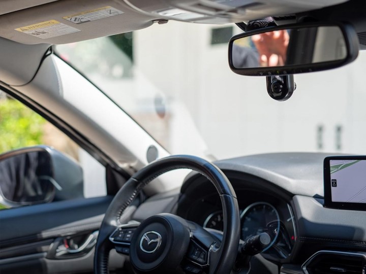 The Nextbase iQ 4K Dash Cam installed in a vehicle.