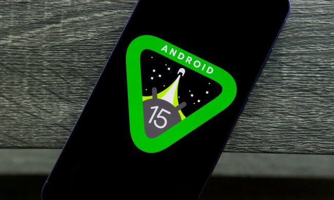 The Android 15 logo on a smartphone.