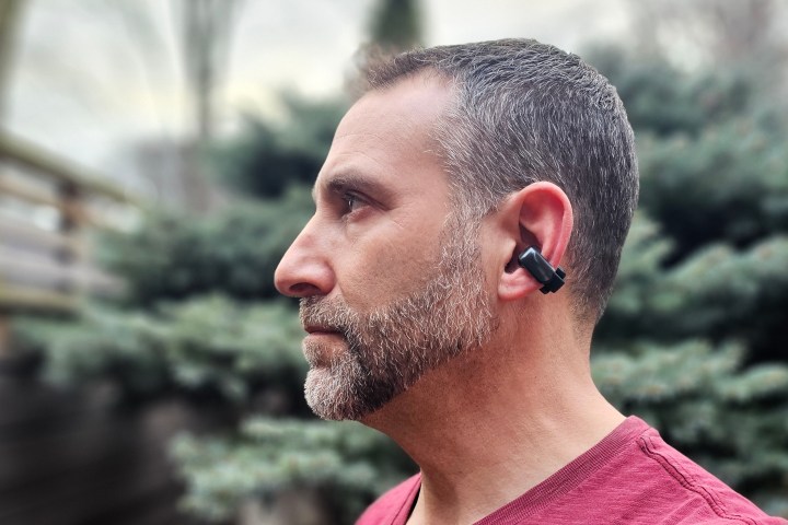 Simon Cohen wearing the Bose Ultra Open Earbuds.