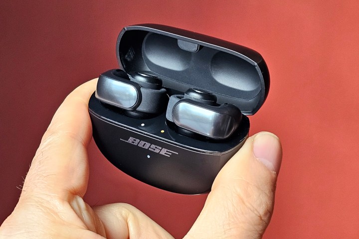 Bose Ultra Open Earbuds inside their charging case.