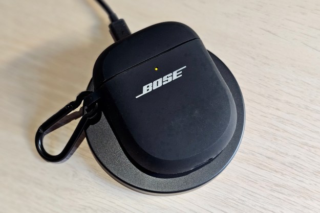 Bose Wireless Charging Case Cover in use on a wireless charging mat.