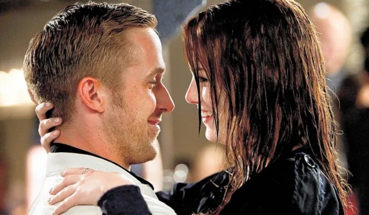 A man and a woman embrace in Crazy, Stupid, Love.