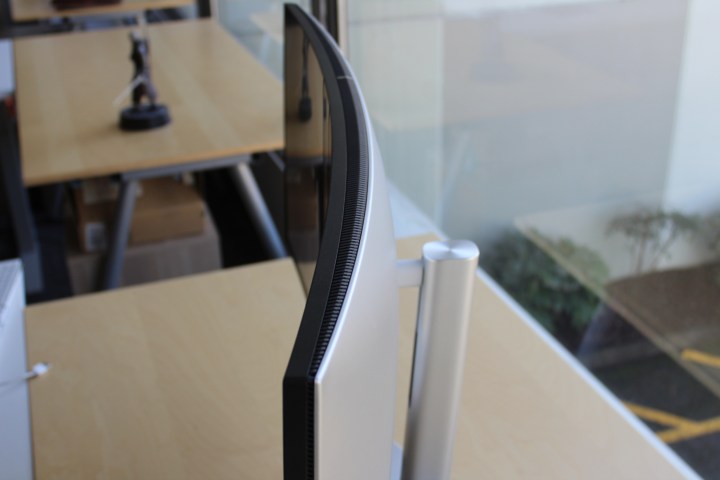 The top curve of the Dell UltraSharp 34 on a desk.
