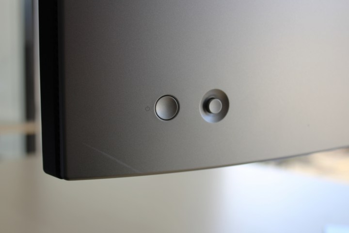 The joystick and power button on the back of the Dell UltraSharp 34.