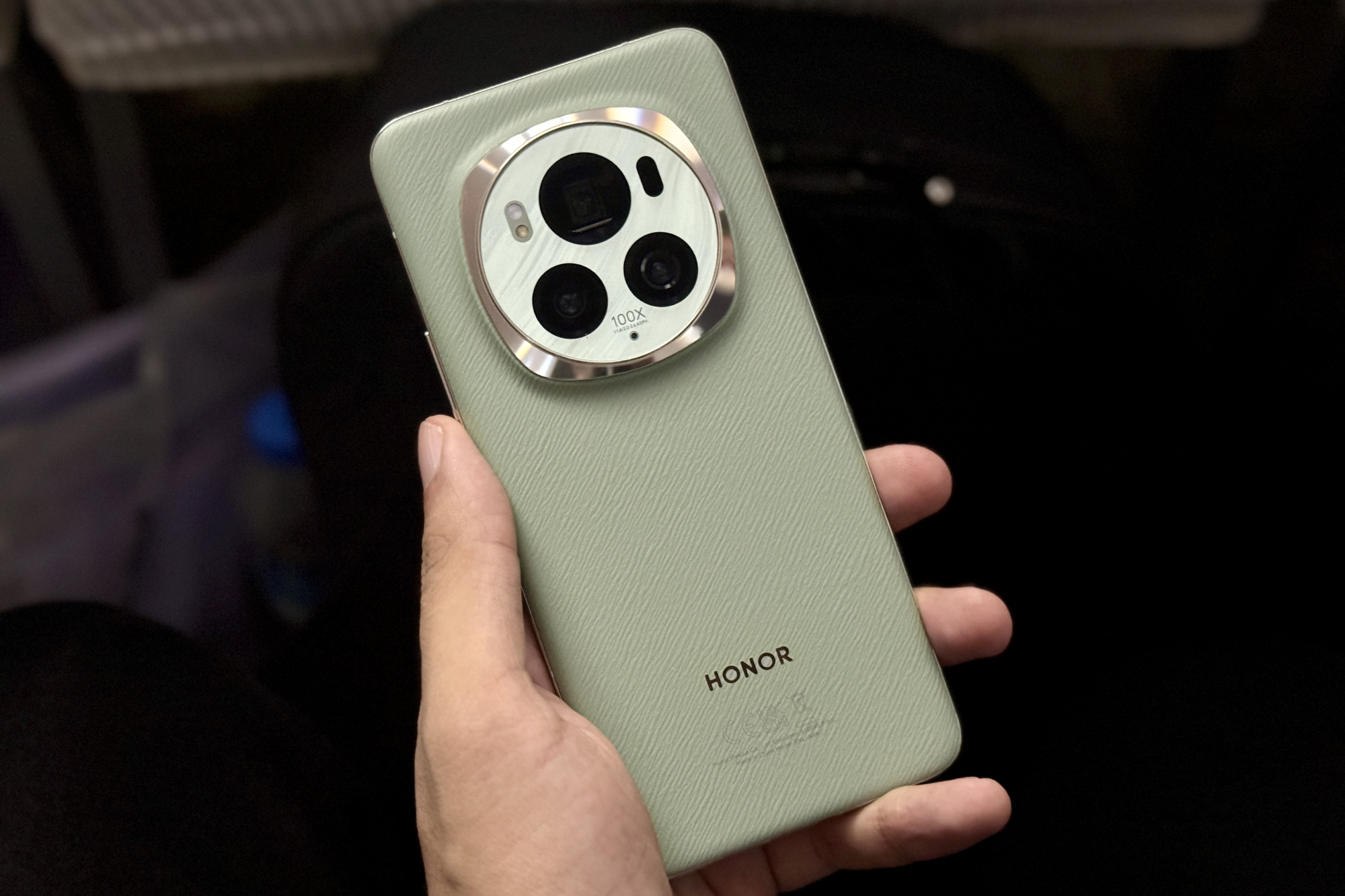 Someone holding the Honor Magic 6 Pro, showing the back of the phone.