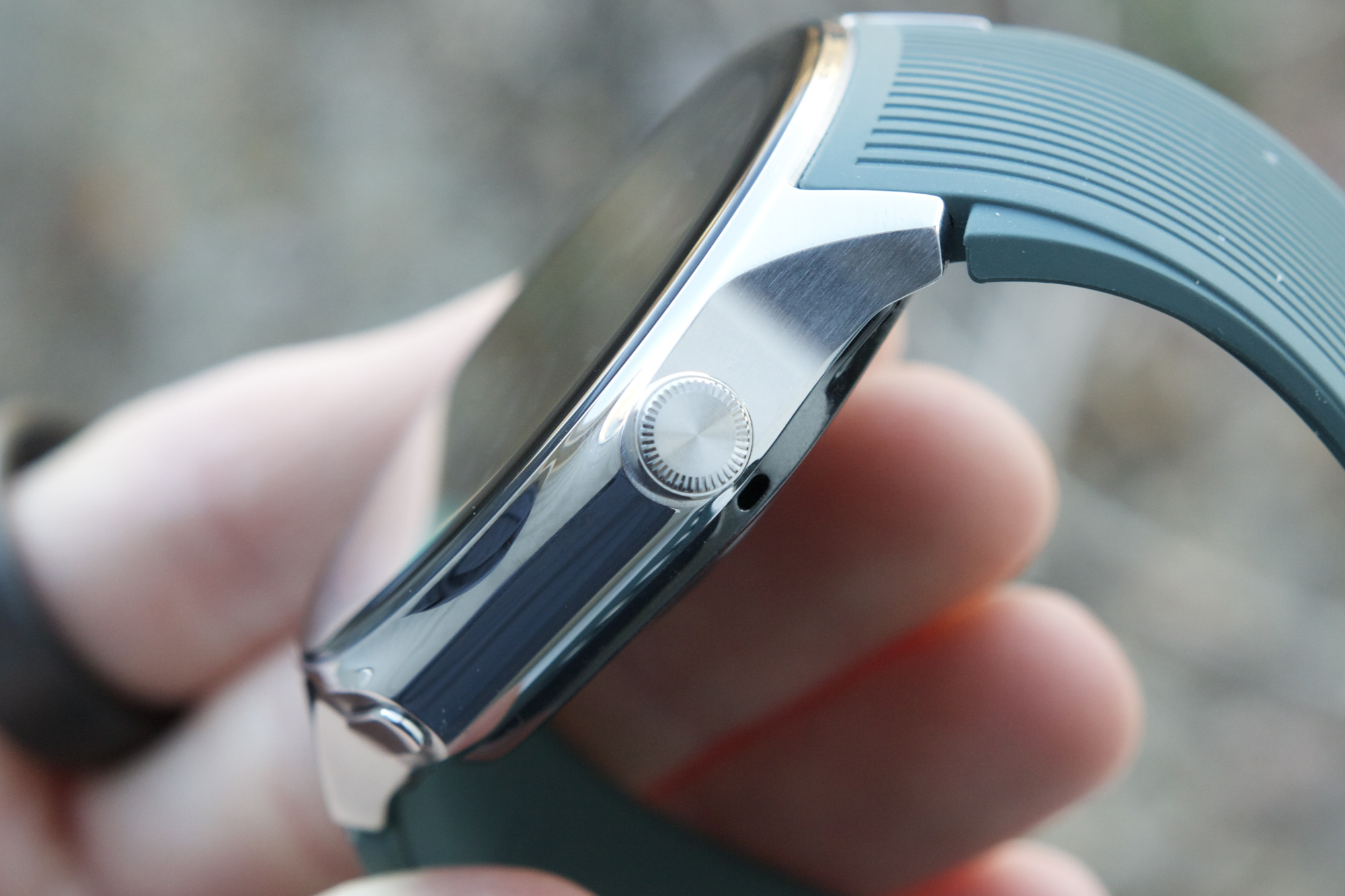 A close-up of the crown on the OnePlus Watch 2.