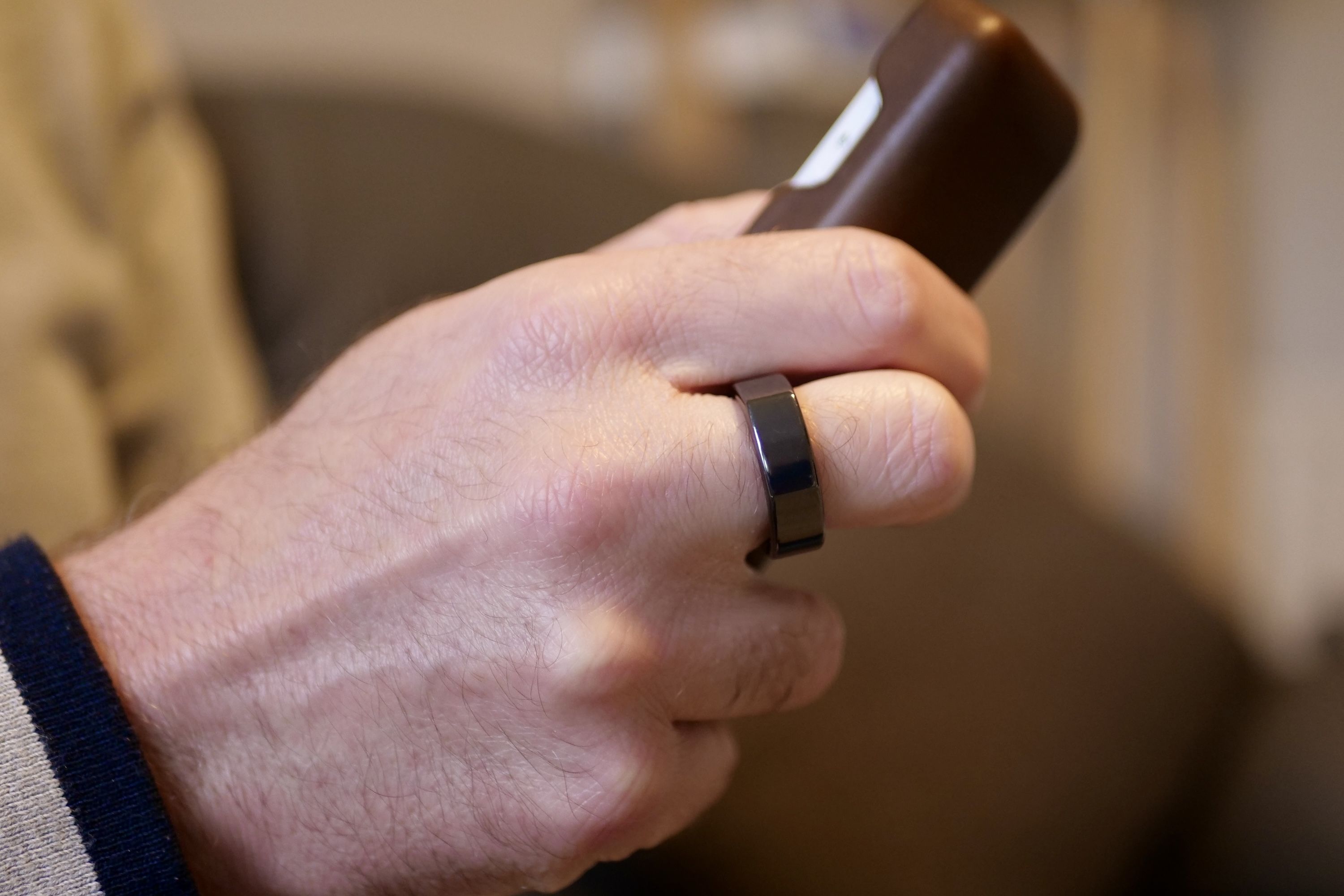 A person wearing the Oura Ring.