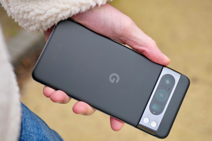 A person holding the Google Pixel 8 Pro.