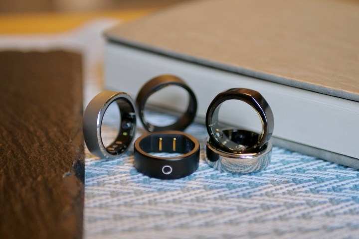Various smart rings together on a table.