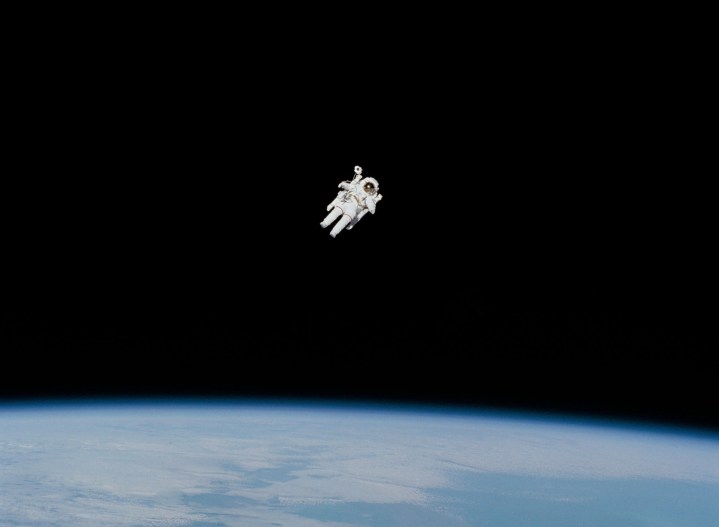 NASA astronaut Bruce McCandless II performing the first untethered spacewalk in 1984.