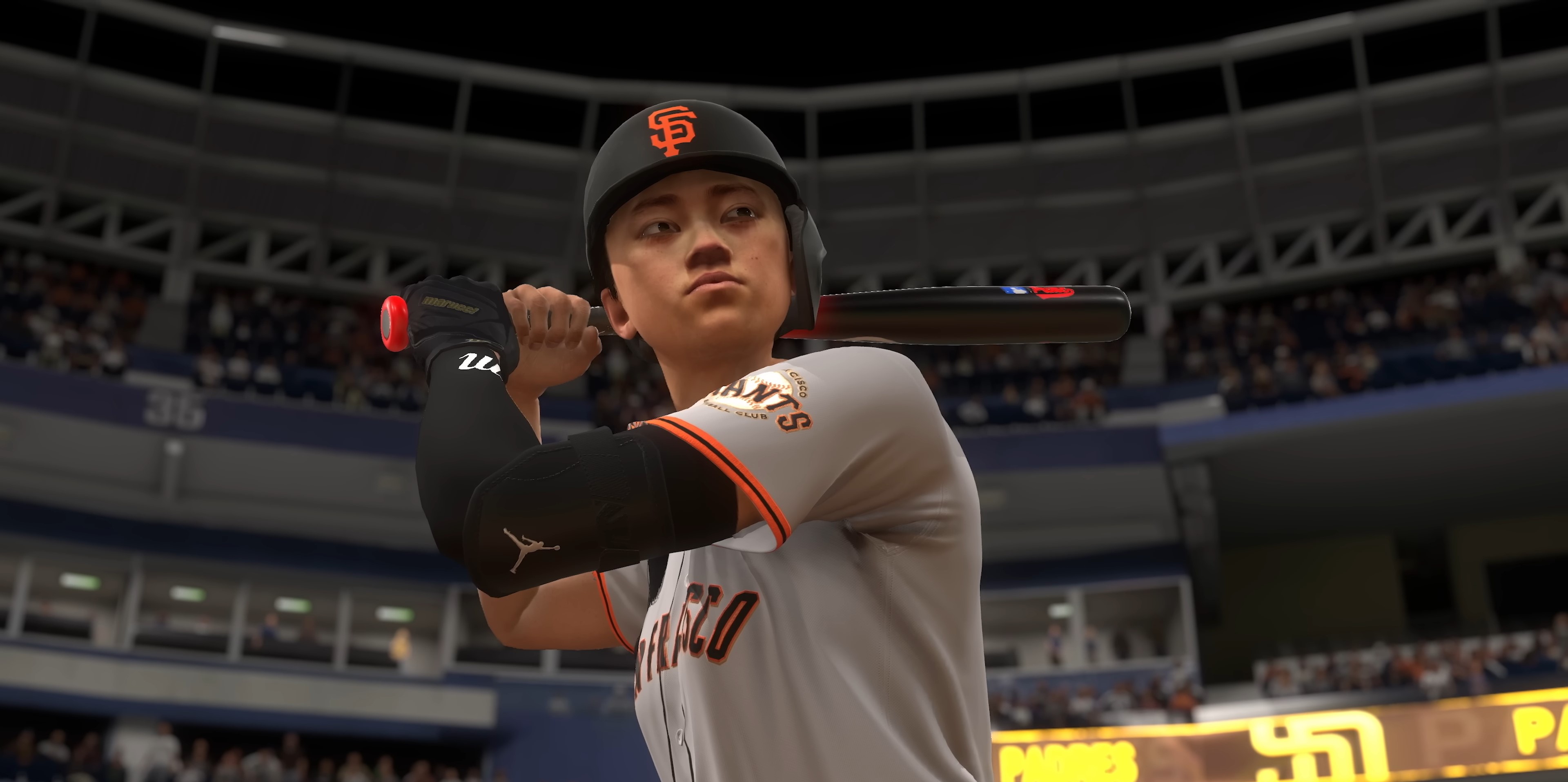A woman plays baseball in MLB The Show 24.