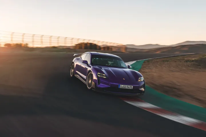 A 2025 Porsche Taycan Turbo GT on a racetrack.