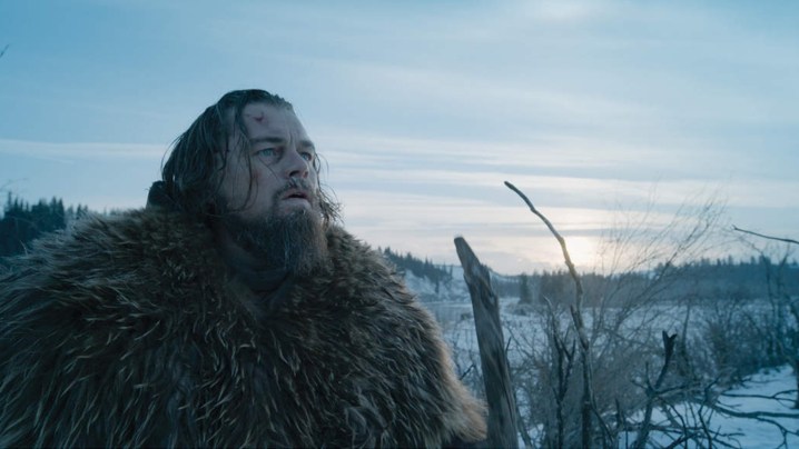 A battered Hugh Glass (DiCaprio) as he navigates the snowy wilderness.