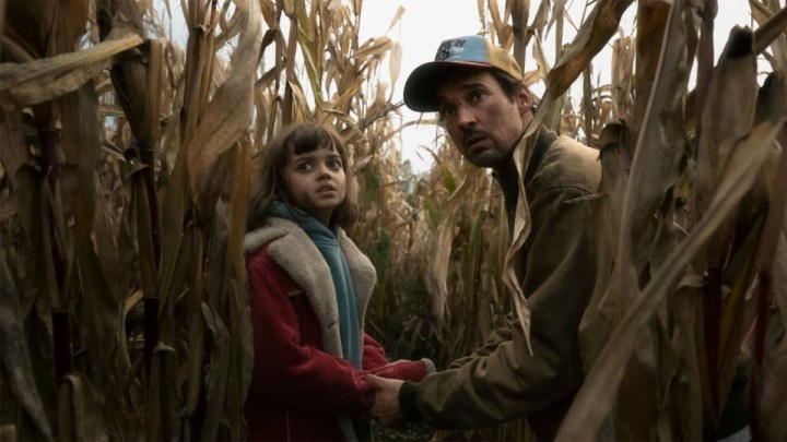 A father and a daughter hide in the cornfields in The Signal.