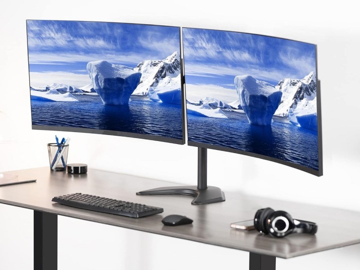 The Vivo Premium Dual Ultra Wide Monitor Desk Stand with monitors.