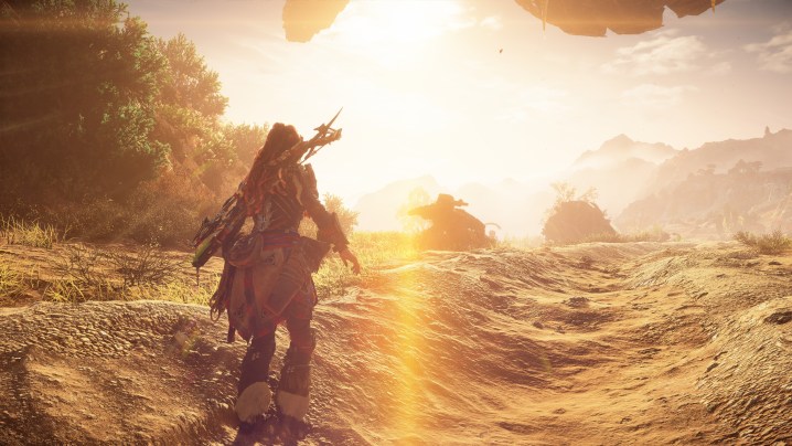 Aloy walking out of a cave in Horizon Forbidden West.