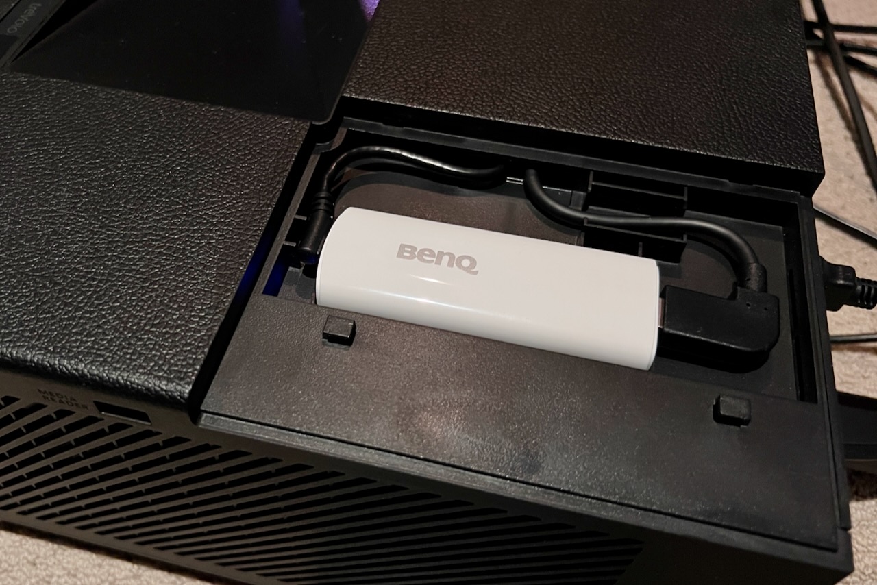 The included Android TV dongle of the BenQ V5000i UST projector