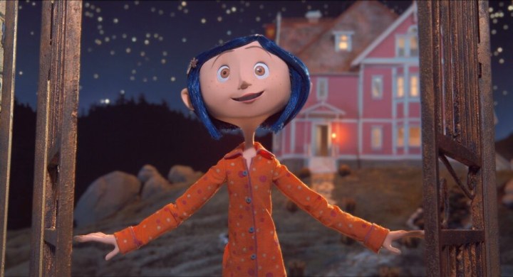 A girl smiles outside in Coraline.