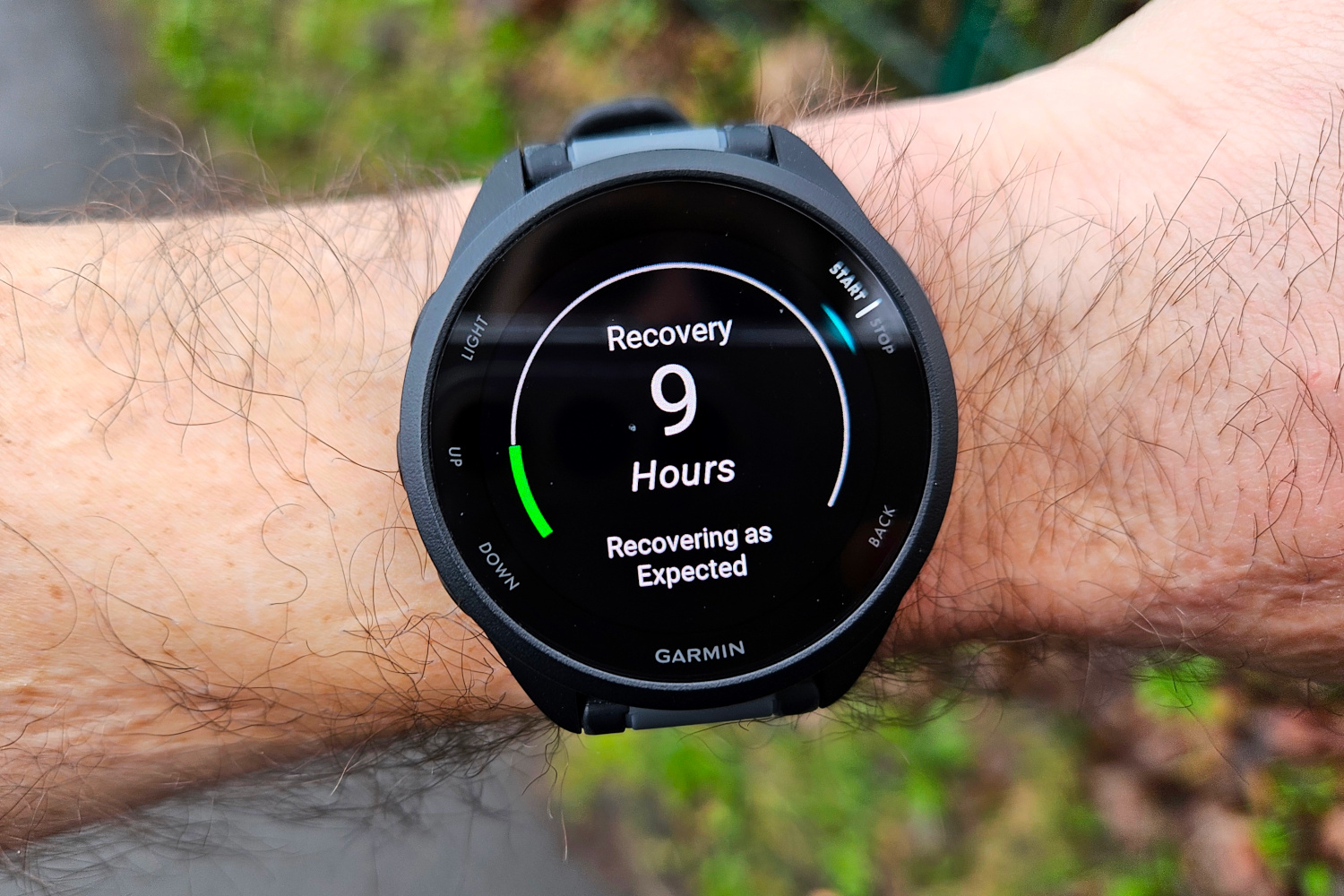 The Garmin Forerunner 165, showing a recovery time metric.