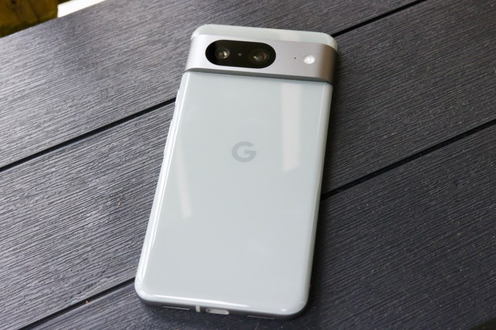 The Google Pixel 8 lying face-down.