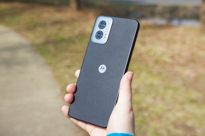 Someone holding the Moto G Power 5G (2024), showing the back of the phone.
