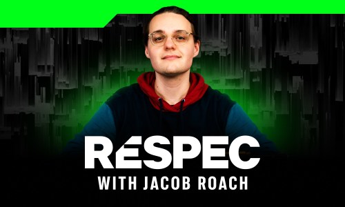 Jacob Roach sitting behind a ReSpec logo. 