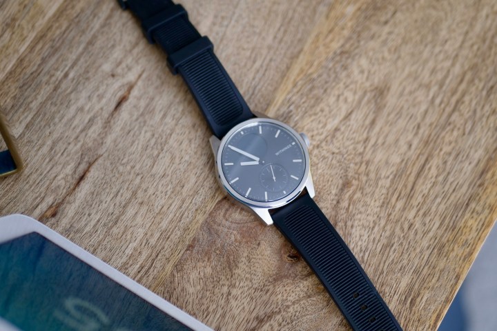 The Withings ScanWatch 2 on a table, showing a replacement strap.