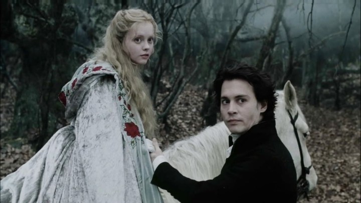 A girl on a horse and a man talk in Sleepy Hollow.
