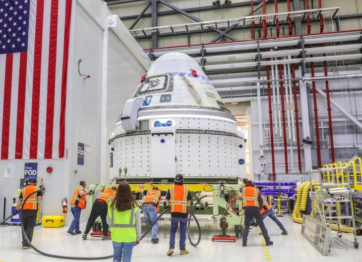 Engineers fuel Boeing's Starliner spacecraft.