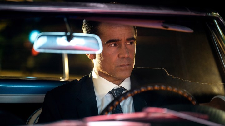 Colin Farrell sitting behind the wheel of a car in the series Sugar on Apple TV+.