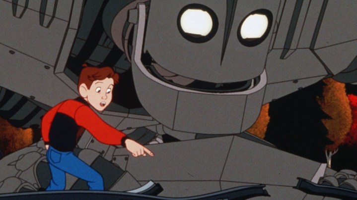《钢铁巨人》中，一个机器人和一个男孩在闲逛。
