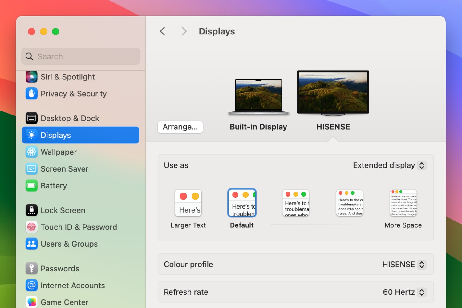 The System Settings app in macOS Sonoma, showing the Displays settings section.