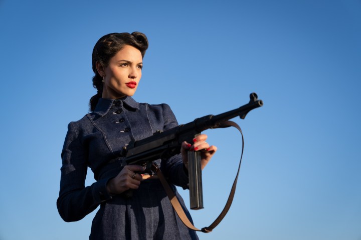 Eiza González holds a gun in The Ministry of Ungentlemanly Warfare.