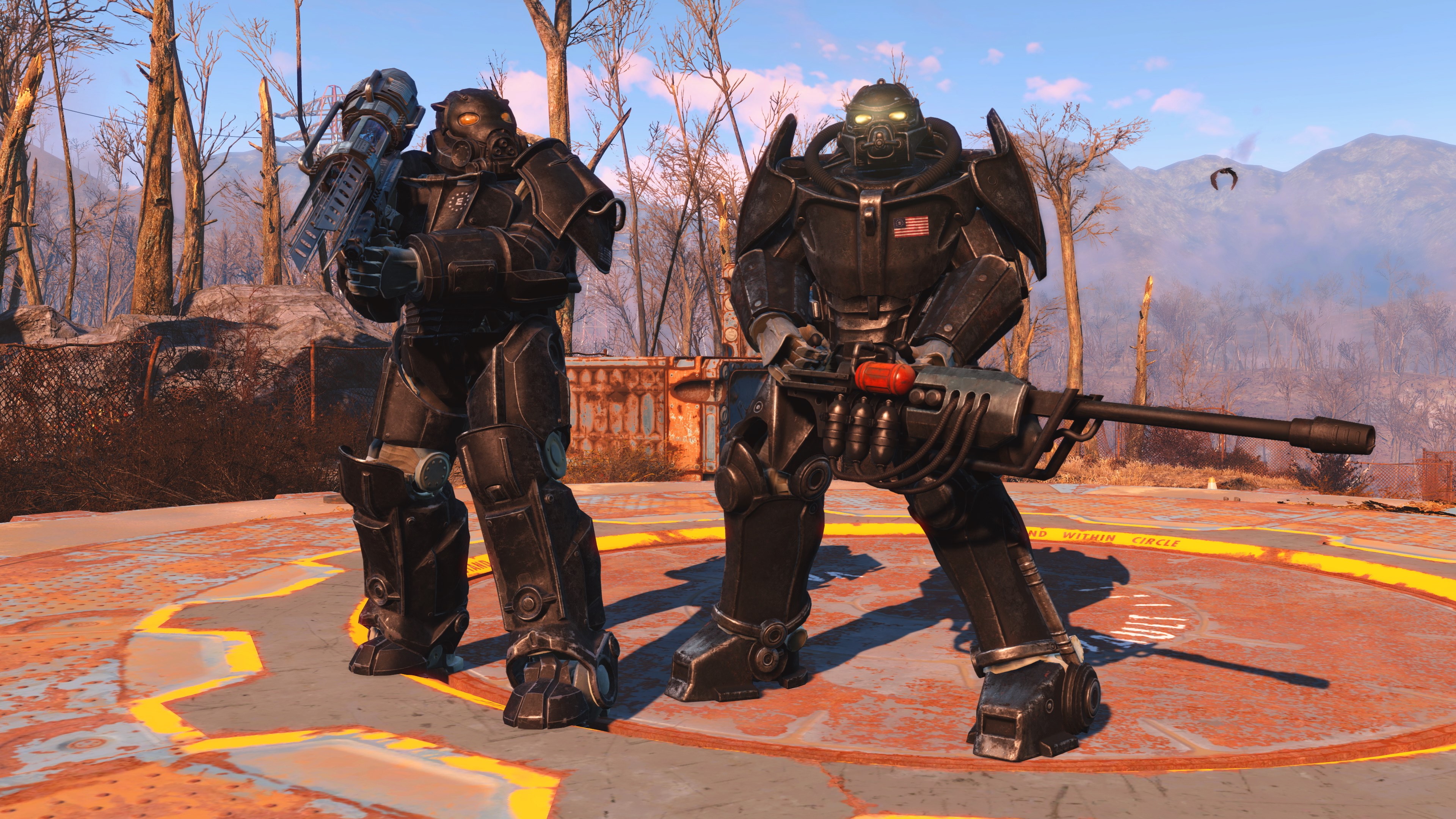 Two characters in power armor in Fallout 4.