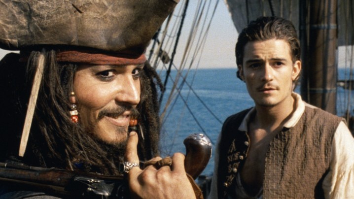 Johnny Depp as Jack Sparrow with Orlando Bloom's Will Turner in Pirates of the Caribbean: The Curse of the Black Pearl.