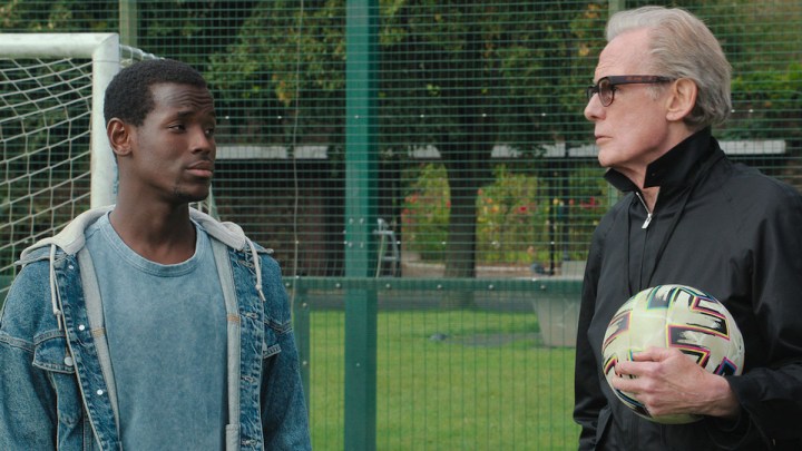 Micheal Ward and Bill Nighy in The Beautiful Game.