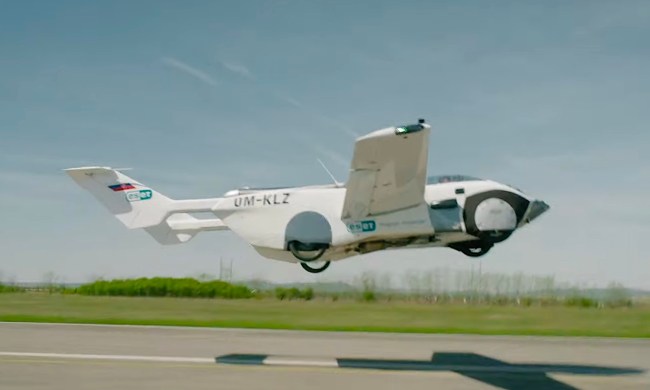 watch this famous musician fly in a car with wings aircar