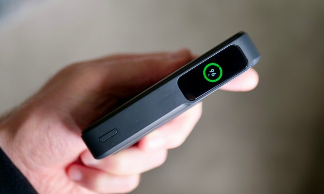 A person holding the Anker MagGo Power Bank.