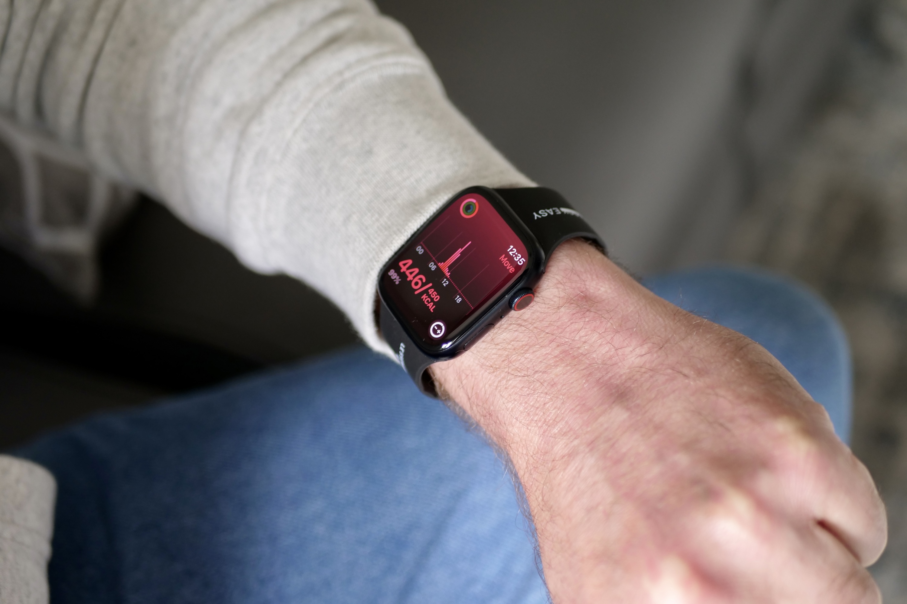 A person checking the fitness data on an Apple Watch Series 9.