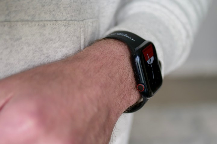A person wearing the Apple Watch Series 9, seen from the side.