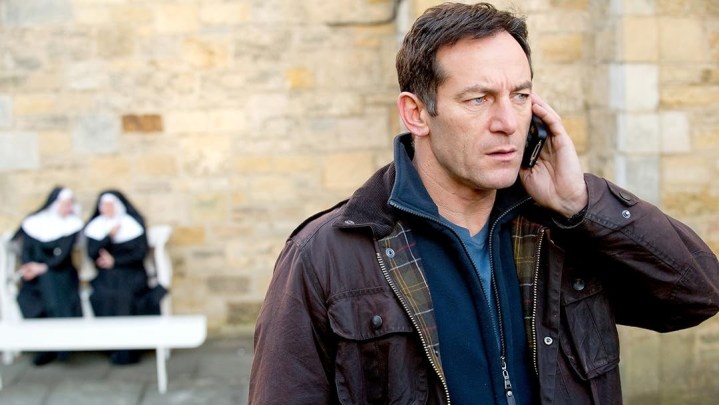 A man talks on the phone in Case Histories.
