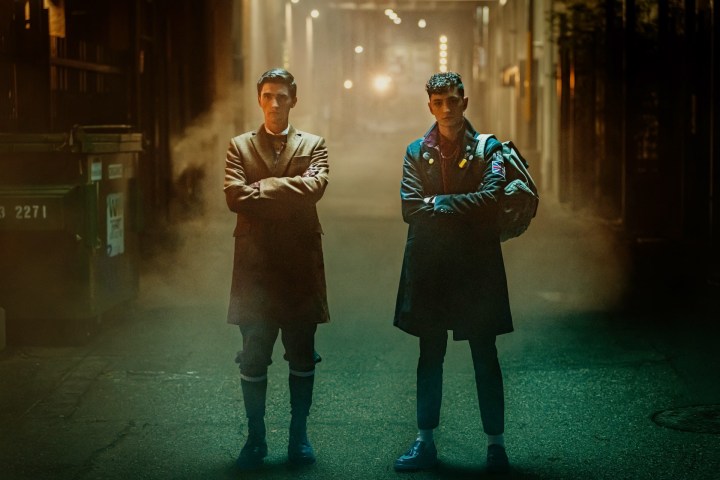 Two men stand in a city alley in Dead Boy Detectives.
