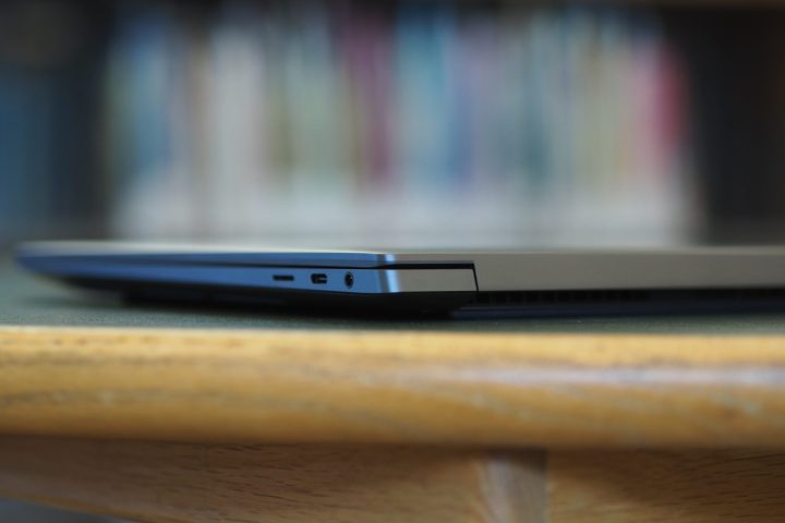 Dell XPS 16 rear edge view showing ports and vents.