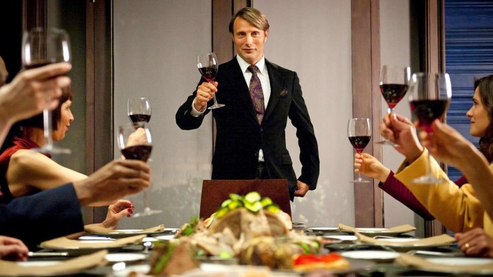 A man raises a wine glass in Hannibal.