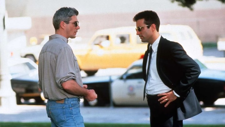 Two cops look at each other in Internal Affairs.