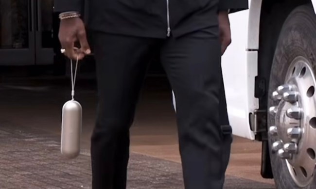 LeBron James carrying what looks like a new Beats Pill speaker.