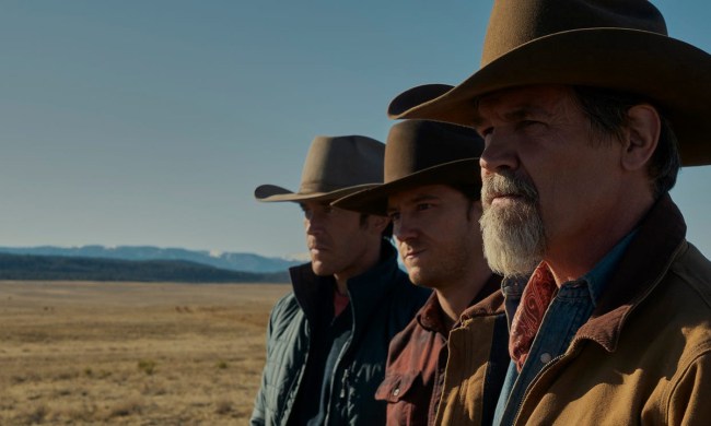 Three men standing in a row wearing cowboy hats in a scene from Outer Range on Amazon Prime Video.