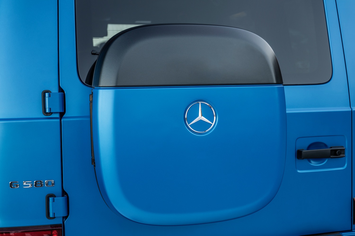 Mercedes-Benz G580 with EQ Technology charge cable cover.